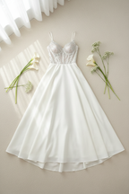 Vestido nupcial blanco corpino pedrería bordado falda A-line C.1941
