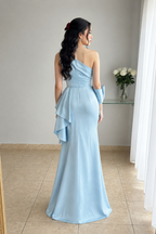 Vestido largo celeste de un hombro con pedrería y gran lazo cod. VC014