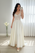 Vestido nupcial blanco corpino pedrería bordado falda A-line C.1941